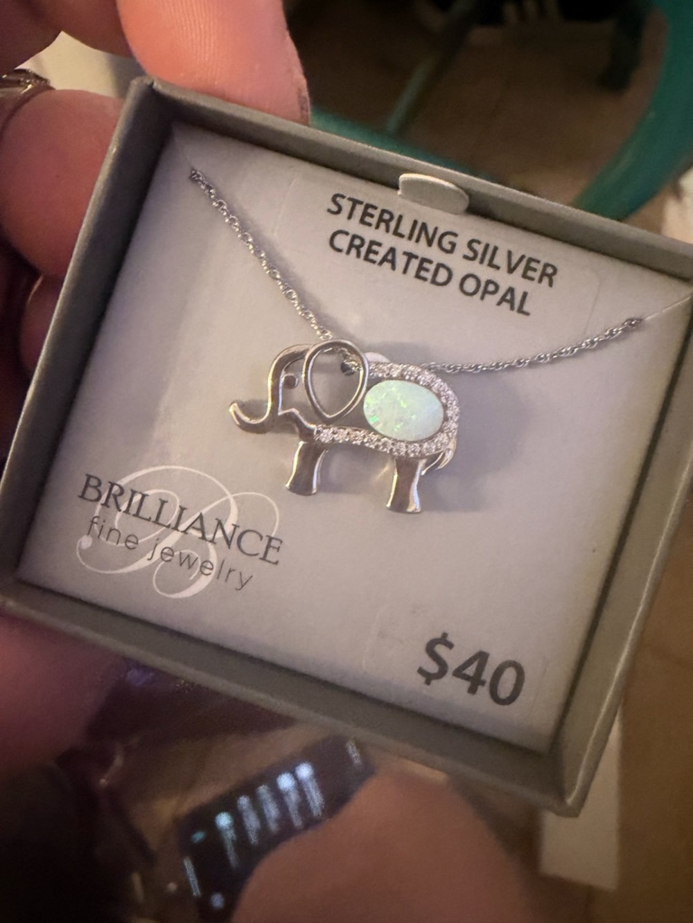 Brilliance Sterling Silver Elephant Necklace with White Opal Accent
